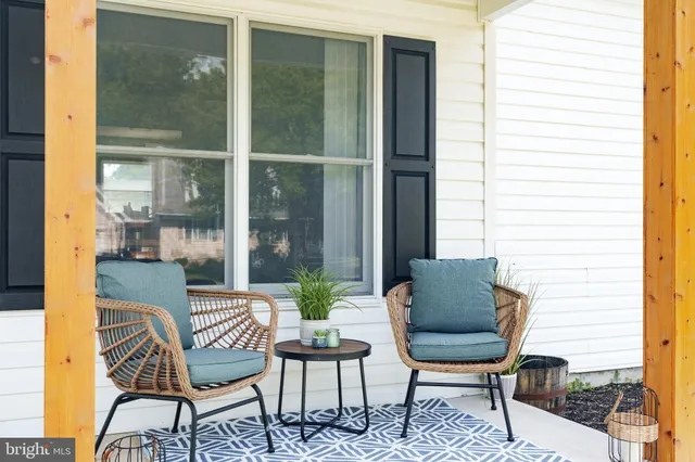 a outdoor living space with furniture and a window