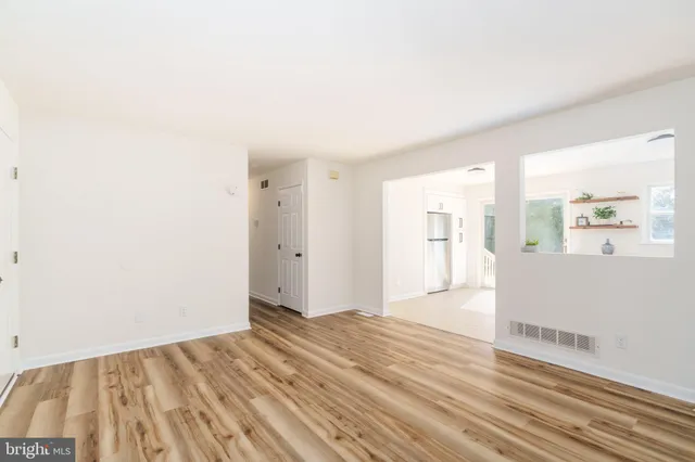 a view of an empty room and window