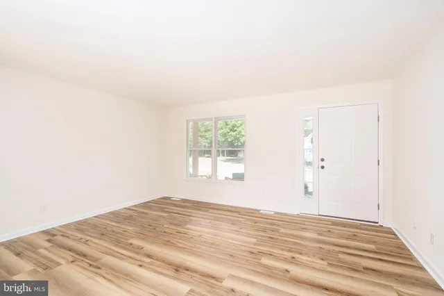 a view of a room with a window