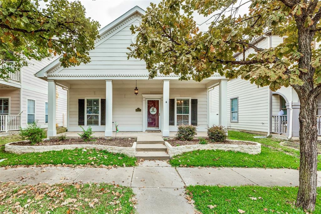 1712 Jasmine Trail Savannah, TX 76227 - Photo 21 of 21 a front view of a house with garden and plants