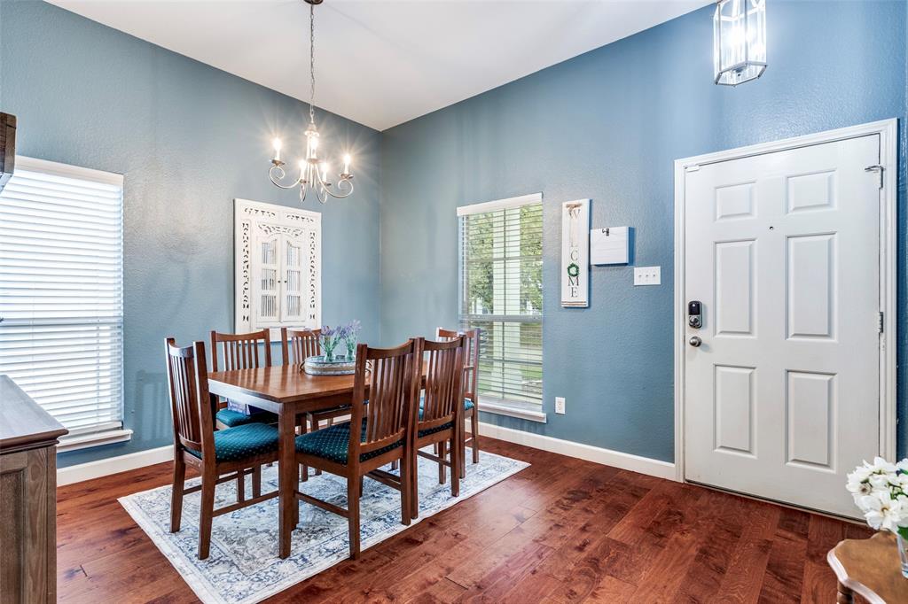 1712 Jasmine Trail Savannah, TX 76227 - Photo 5 of 21 a view of a dining room with furniture window and wooden floor