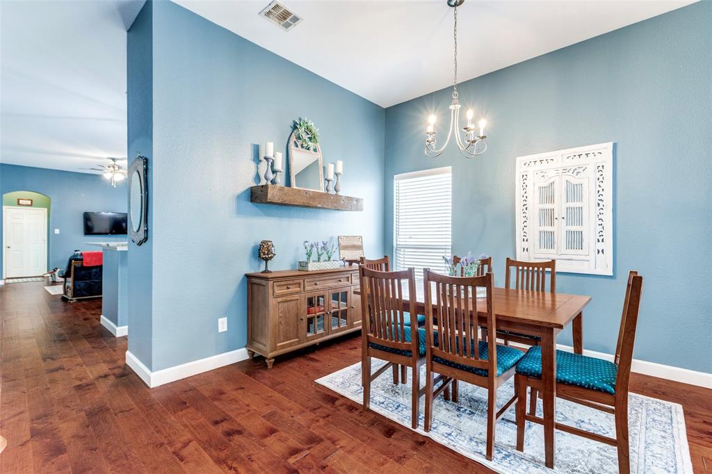 1712 Jasmine Trail Savannah, TX 76227 - Photo 6 of 21 a view of a dining room with furniture