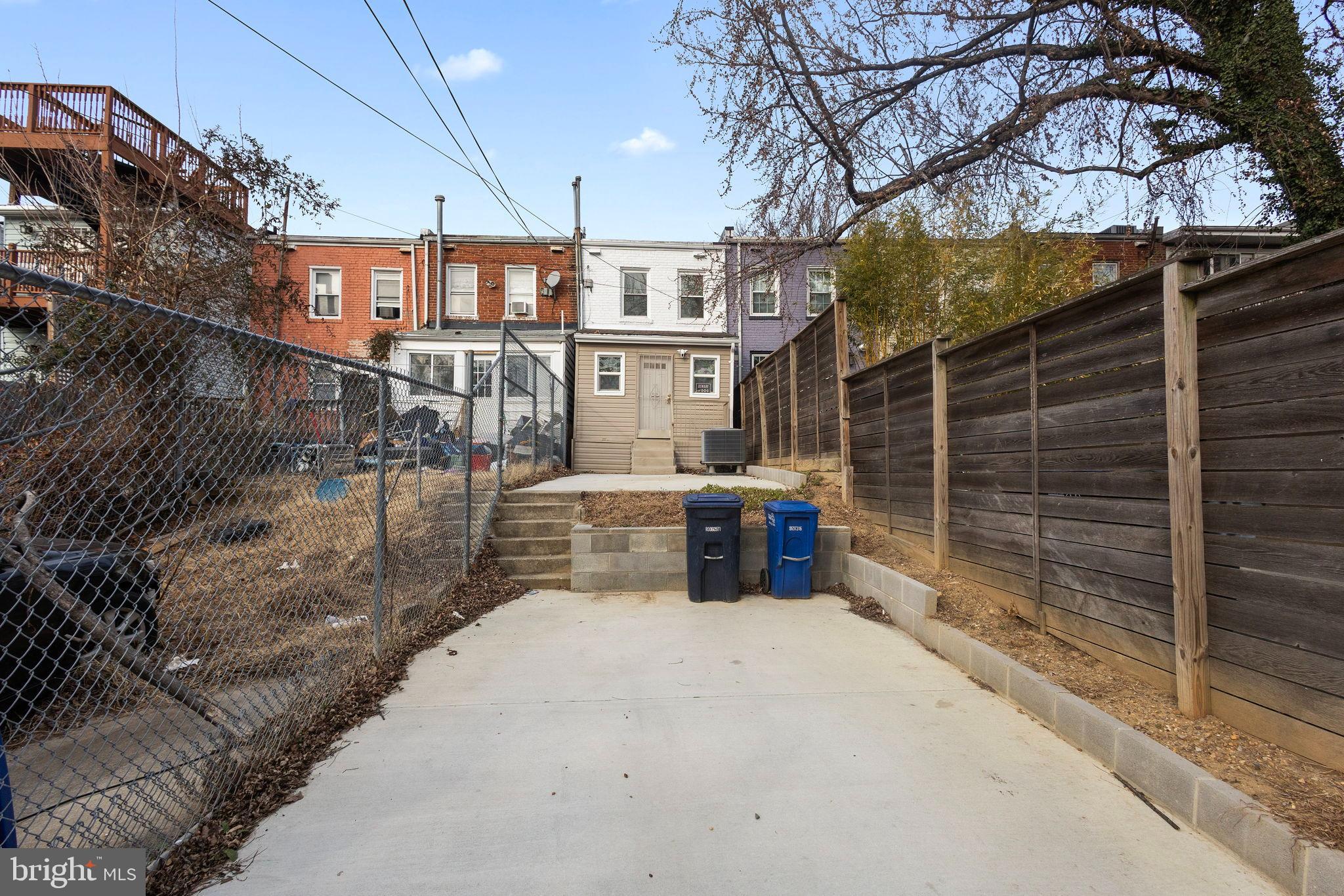 1841 L Street Northeast Washington, DC 20002 - Photo 23 of 31 a view of a house with a backyard