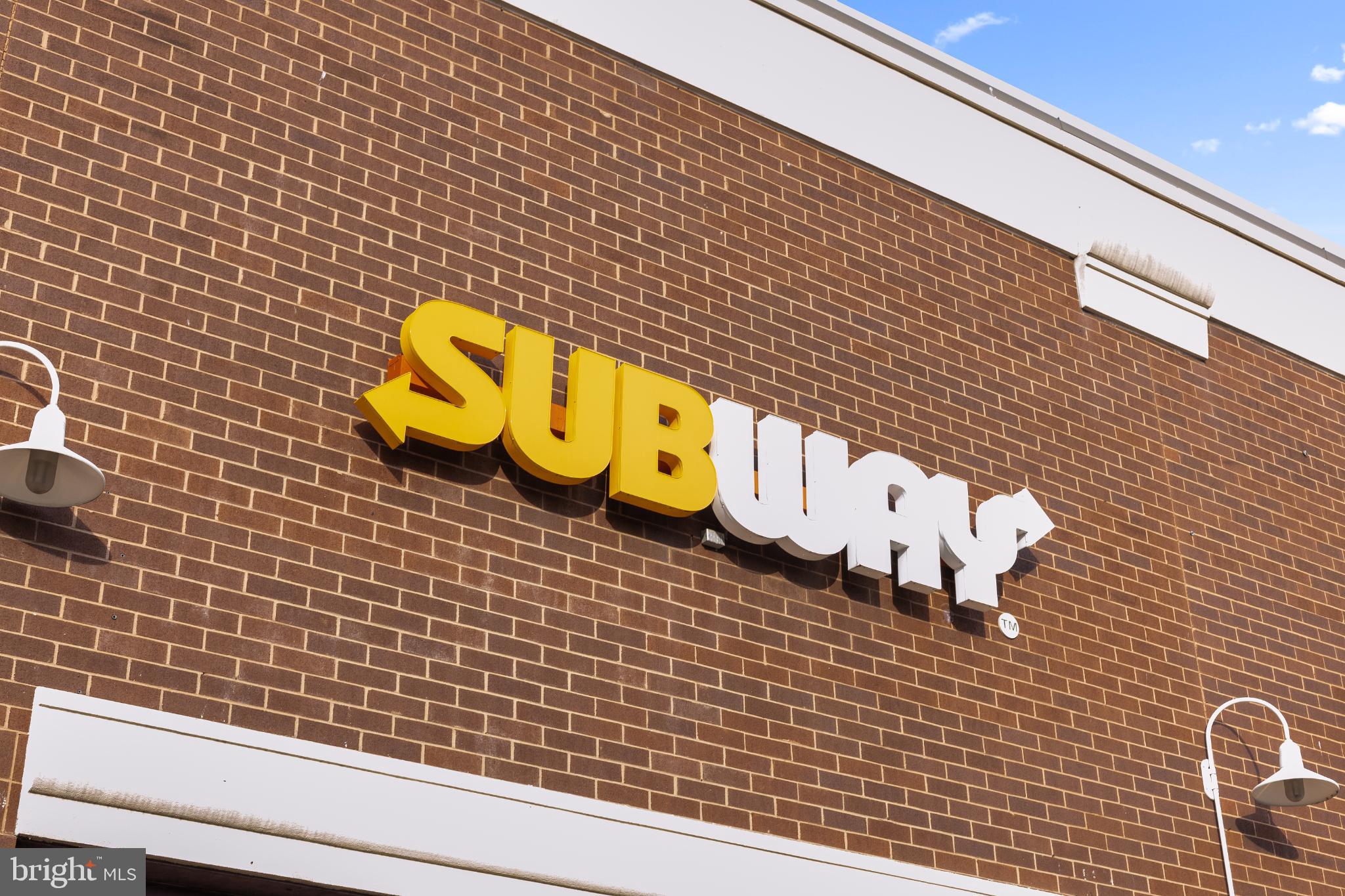 1841 L Street Northeast Washington, DC 20002 - Photo 28 of 31 a bathroom with a sink a toilet and a shower