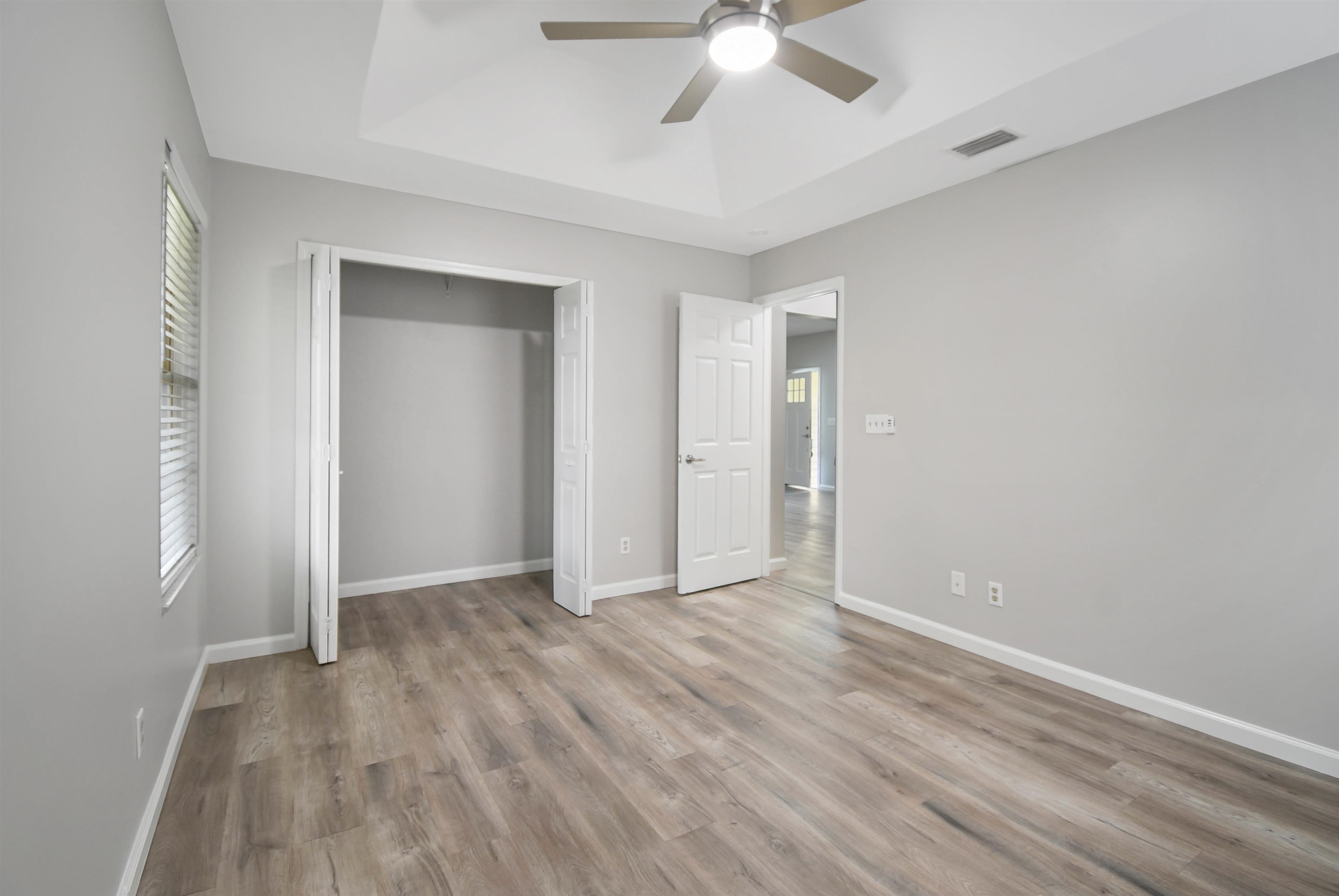 1196 Brookside Court St. Augustine, FL 32086 - Photo 20 of 29 a view of an empty room with wooden floor