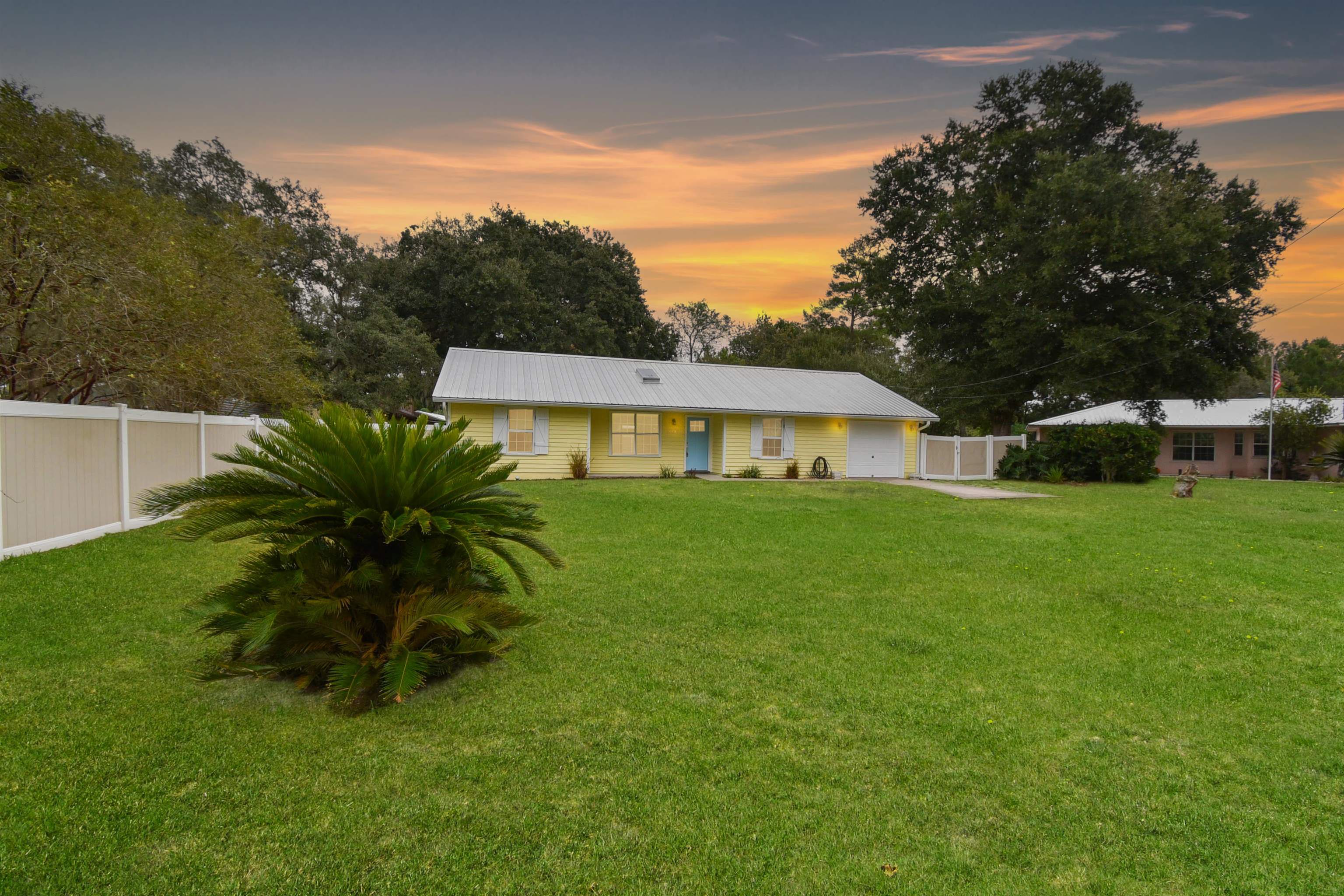 1196 Brookside Court St. Augustine, FL 32086 - Photo 2 of 29 a front view of house with yard and green space