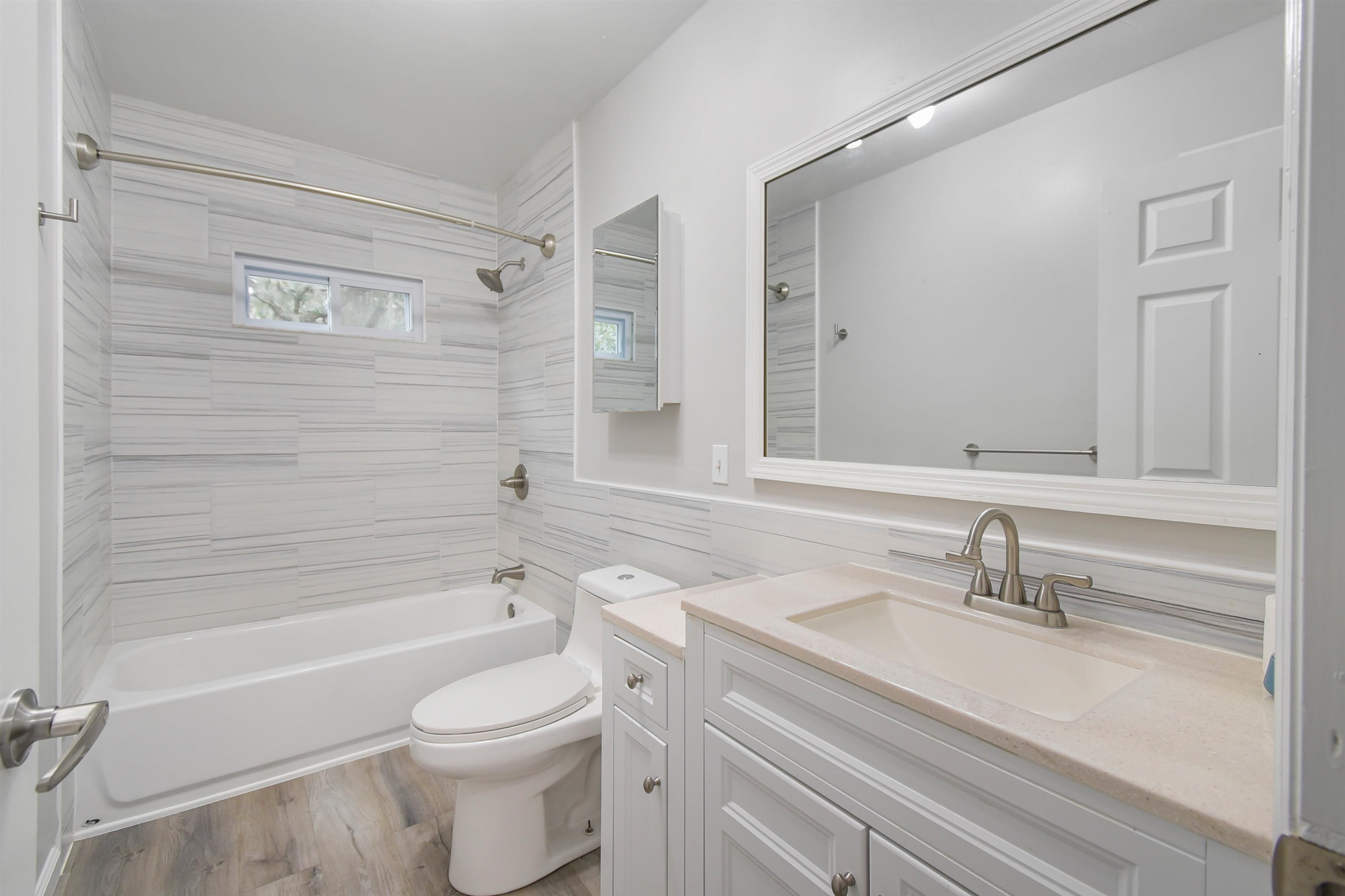 1196 Brookside Court St. Augustine, FL 32086 - Photo 21 of 29 a bathroom with a sink a toilet and shower