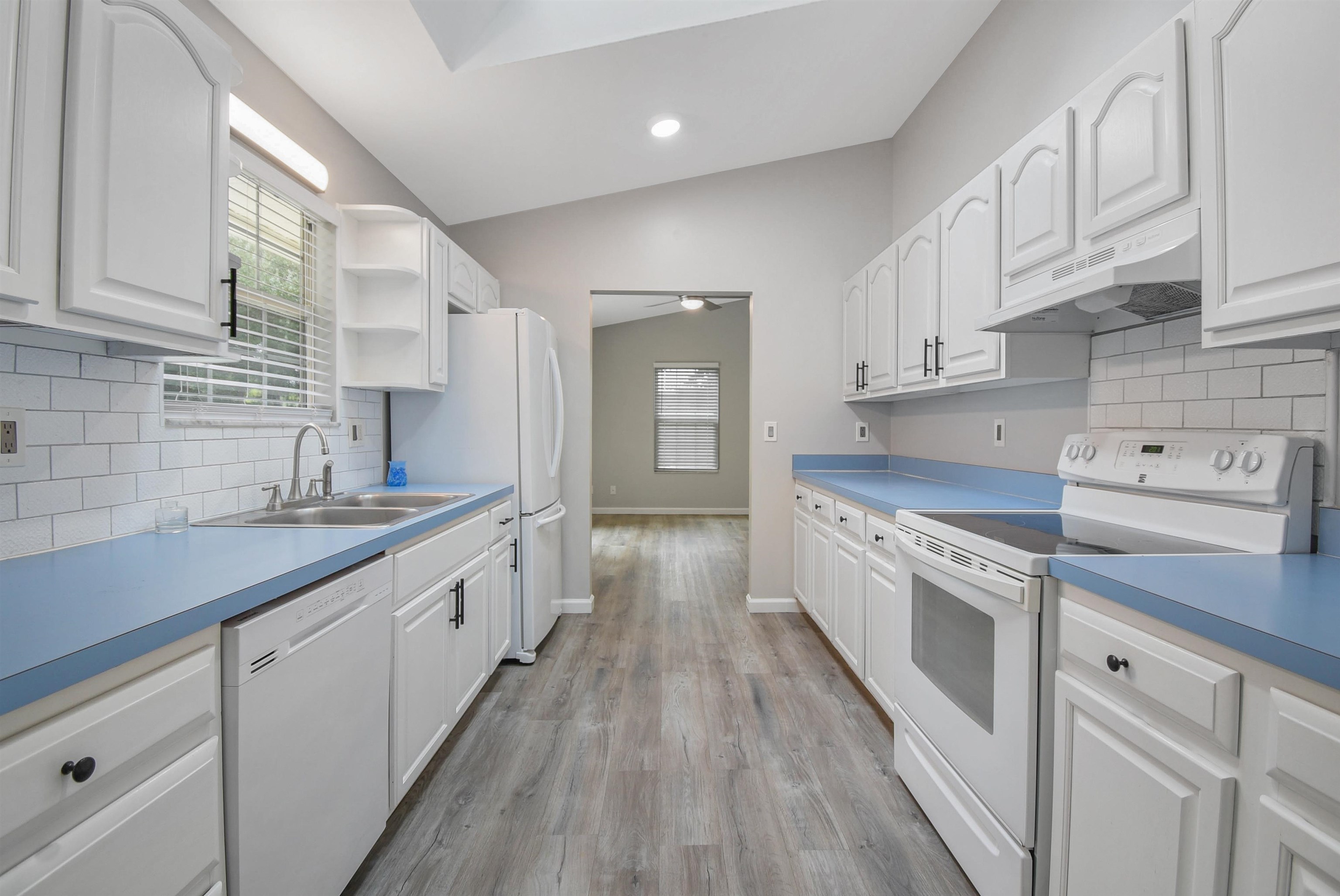 1196 Brookside Court St. Augustine, FL 32086 - Photo 10 of 29 a large kitchen with granite countertop a large counter top space a sink stainless steel appliances and cabinets