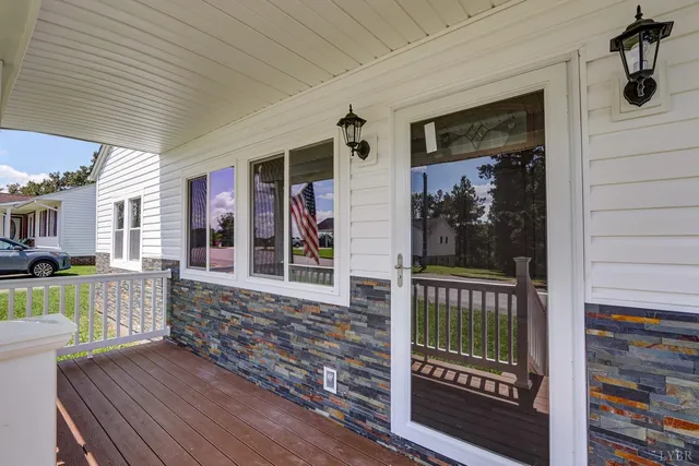 a view of a balcony with furniture