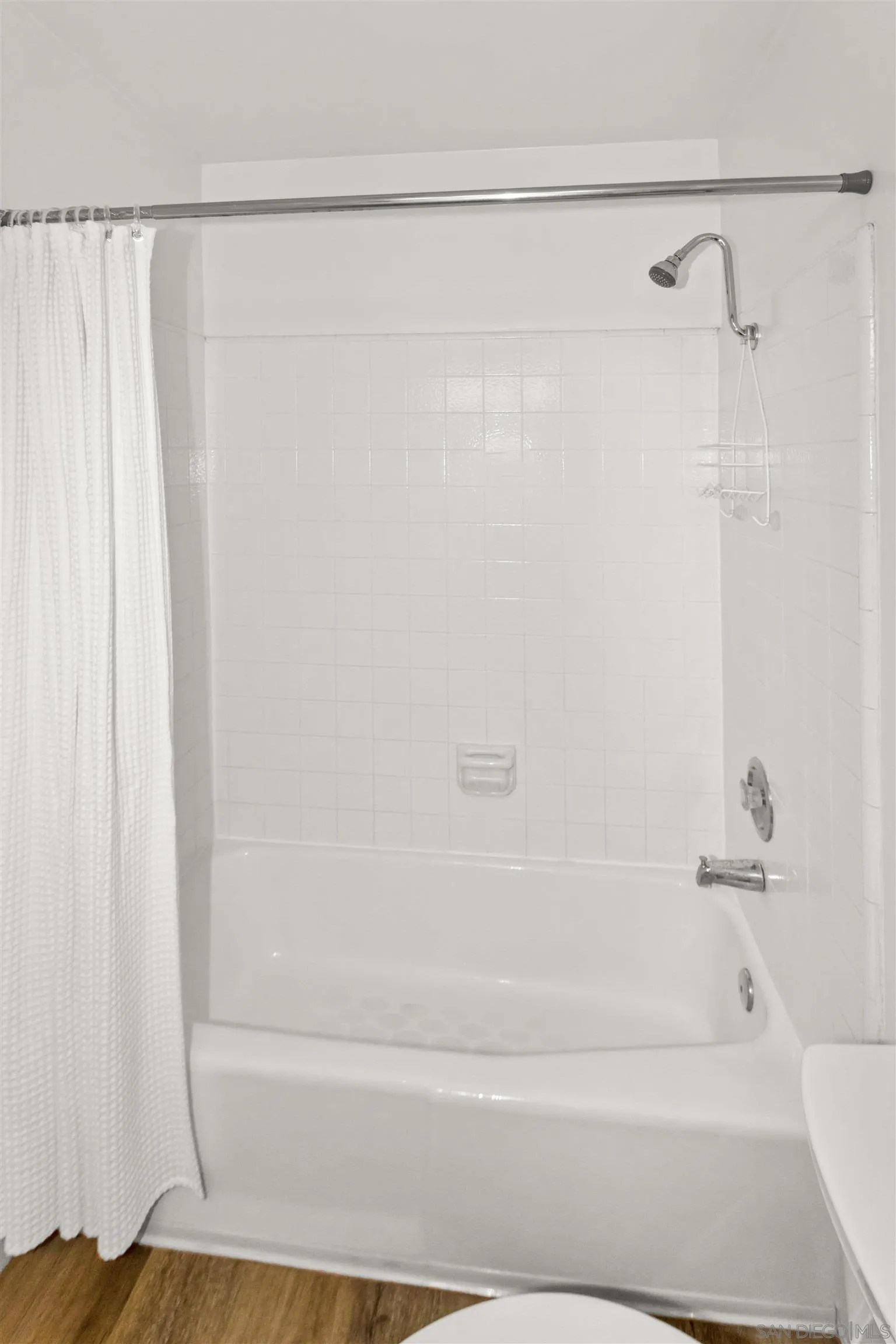 502 E Avenue Coronado, CA 92118 - Photo 13 of 18 a bathroom with a shower and a bathtub