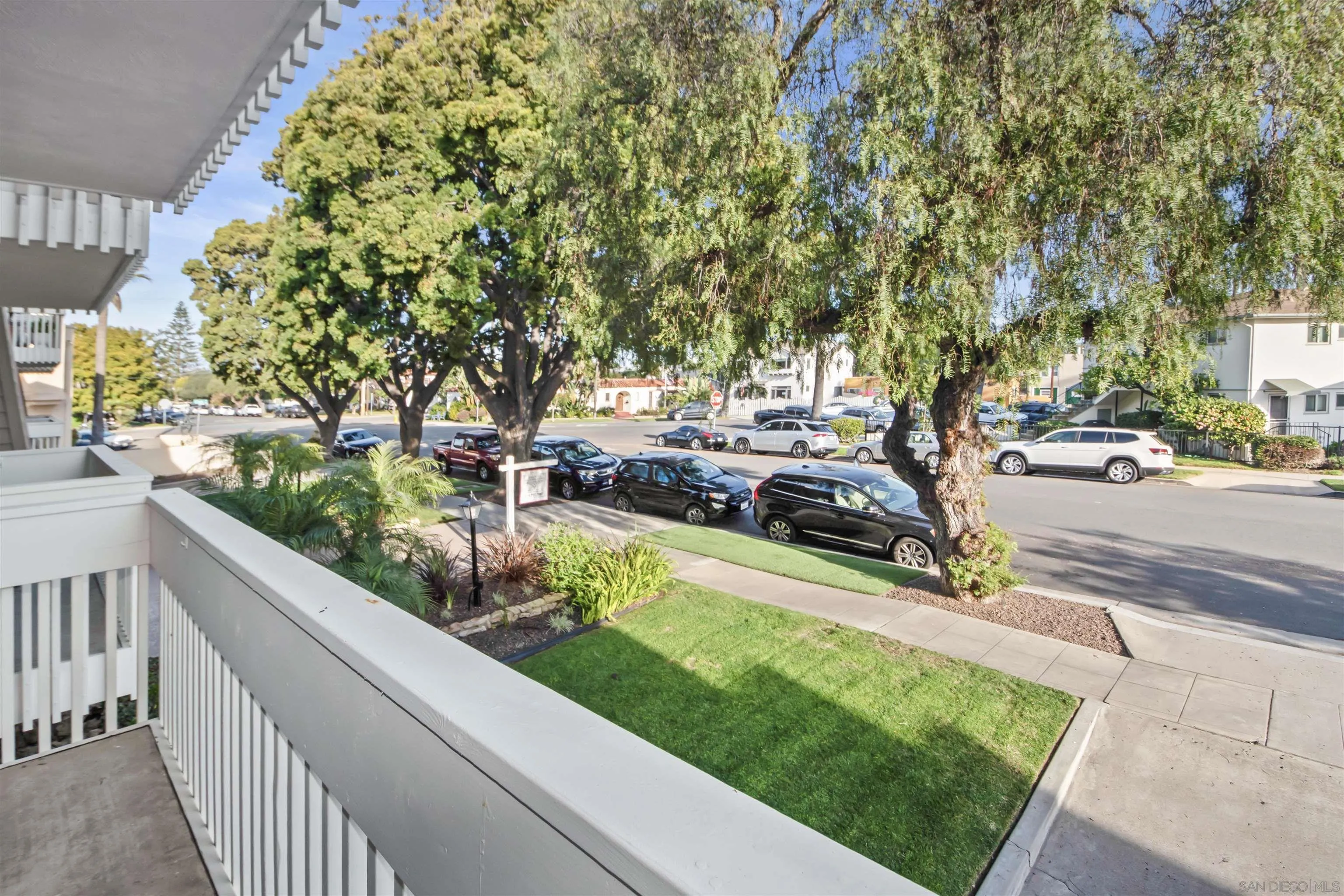 502 E Avenue Coronado, CA 92118 - Photo 17 of 18 a view of a garden with cars parked