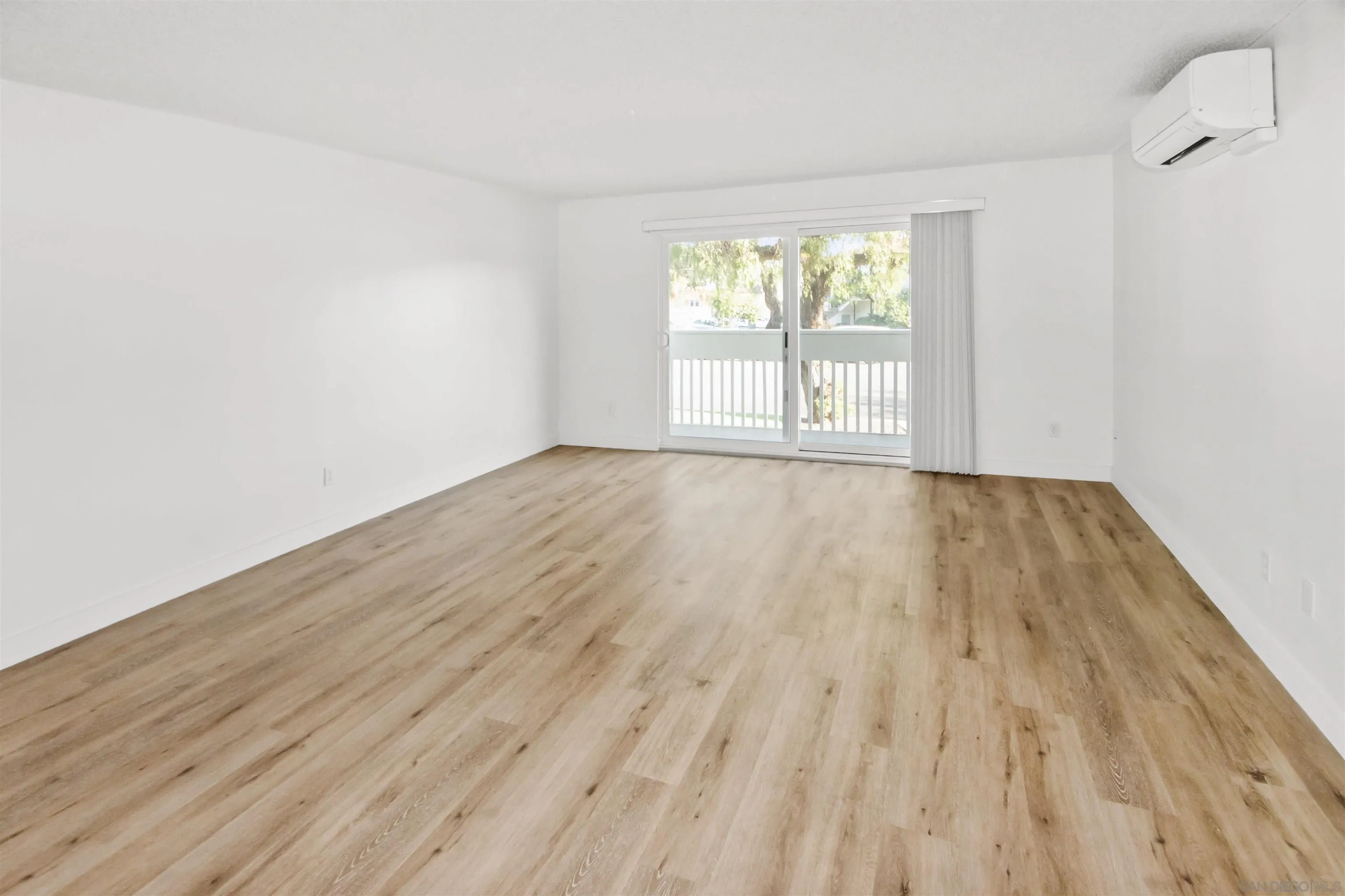 502 E Avenue Coronado, CA 92118 - Photo 5 of 18 a view of an empty room and wooden floor