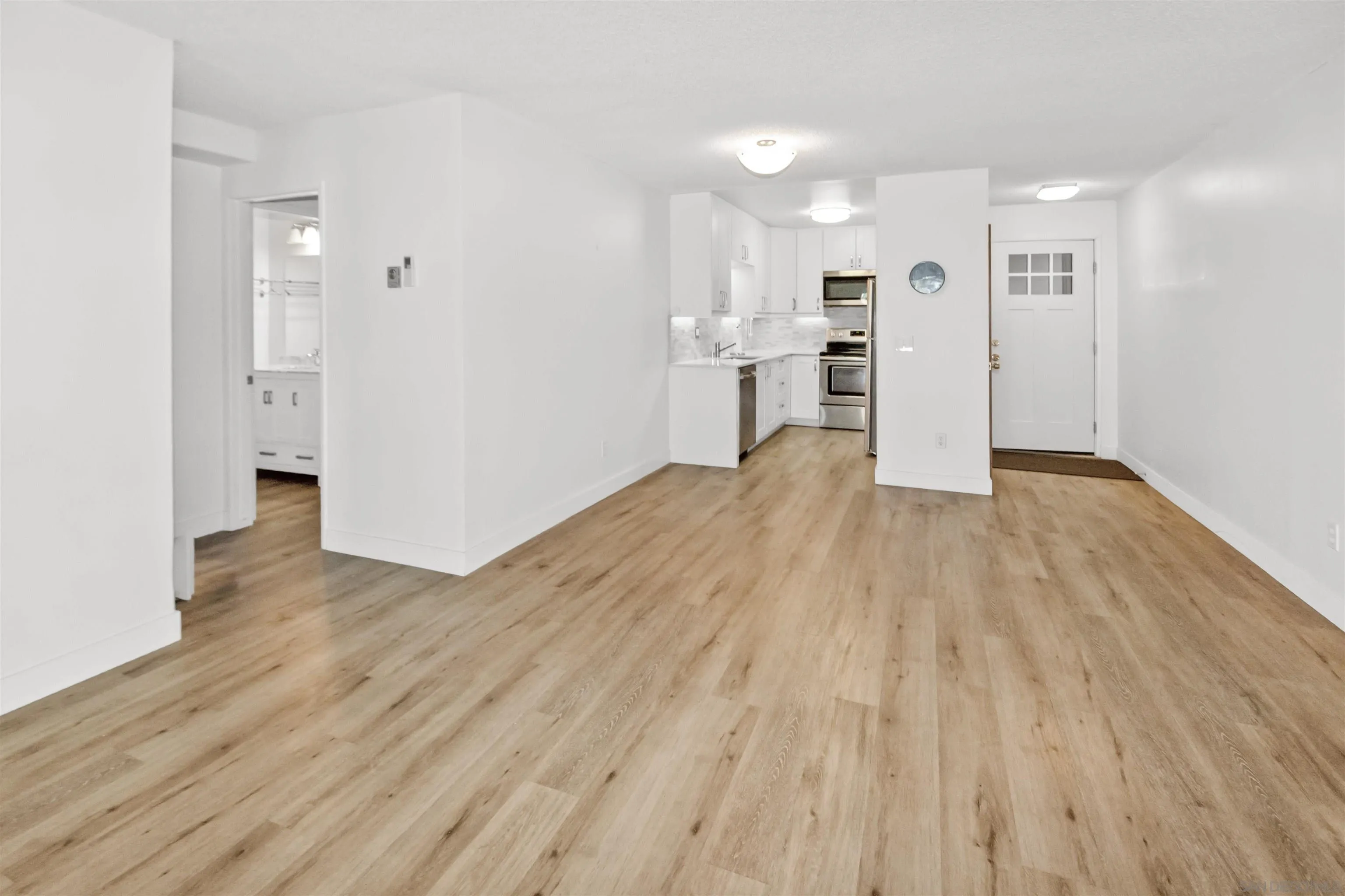 502 E Avenue Coronado, CA 92118 - Photo 7 of 18 a view of kitchen with wooden floor