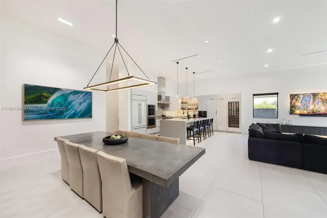 a kitchen with a stove and a refrigerator