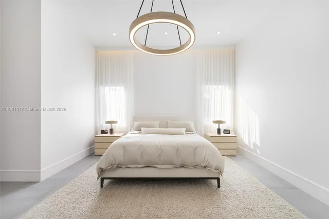 a view of a bathroom with a sink and mirror with toilet