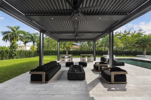 a kitchen with a stove and a sink