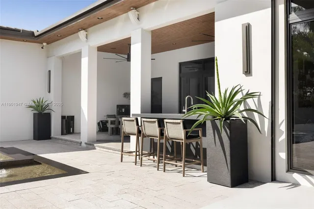 a view of a backyard with a patio