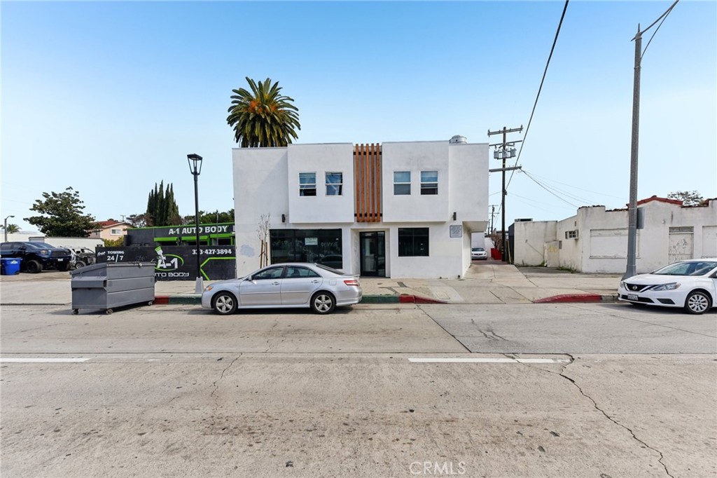 9320 Long Beach Boulevard South Gate, CA 90280 - Photo 1 of 30 a view of a cars parked in front of a house