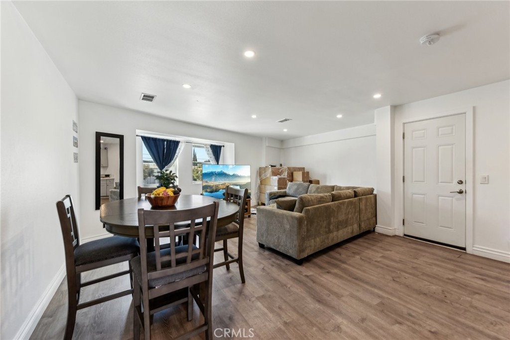 9320 Long Beach Boulevard South Gate, CA 90280 - Photo 11 of 30 a living room with furniture and kitchen view