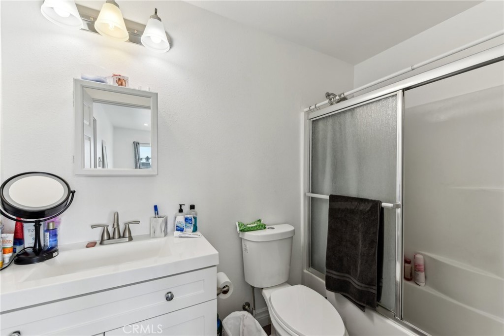 9320 Long Beach Boulevard South Gate, CA 90280 - Photo 17 of 30 a bathroom with a sink toilet and shower