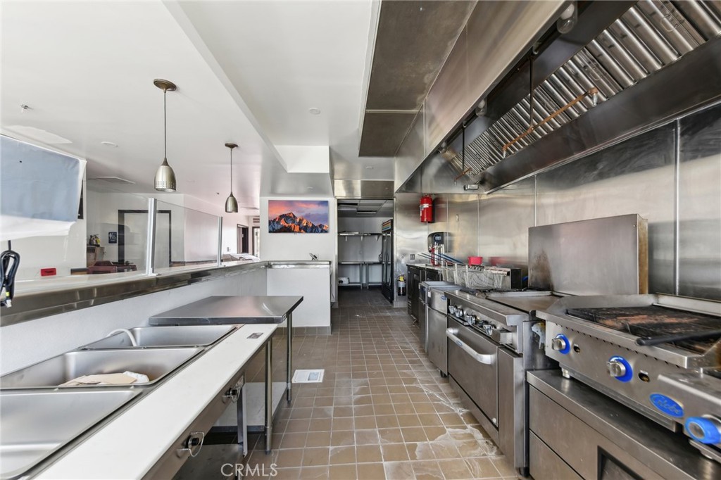 9320 Long Beach Boulevard South Gate, CA 90280 - Photo 24 of 30 a kitchen with lots of counter top space