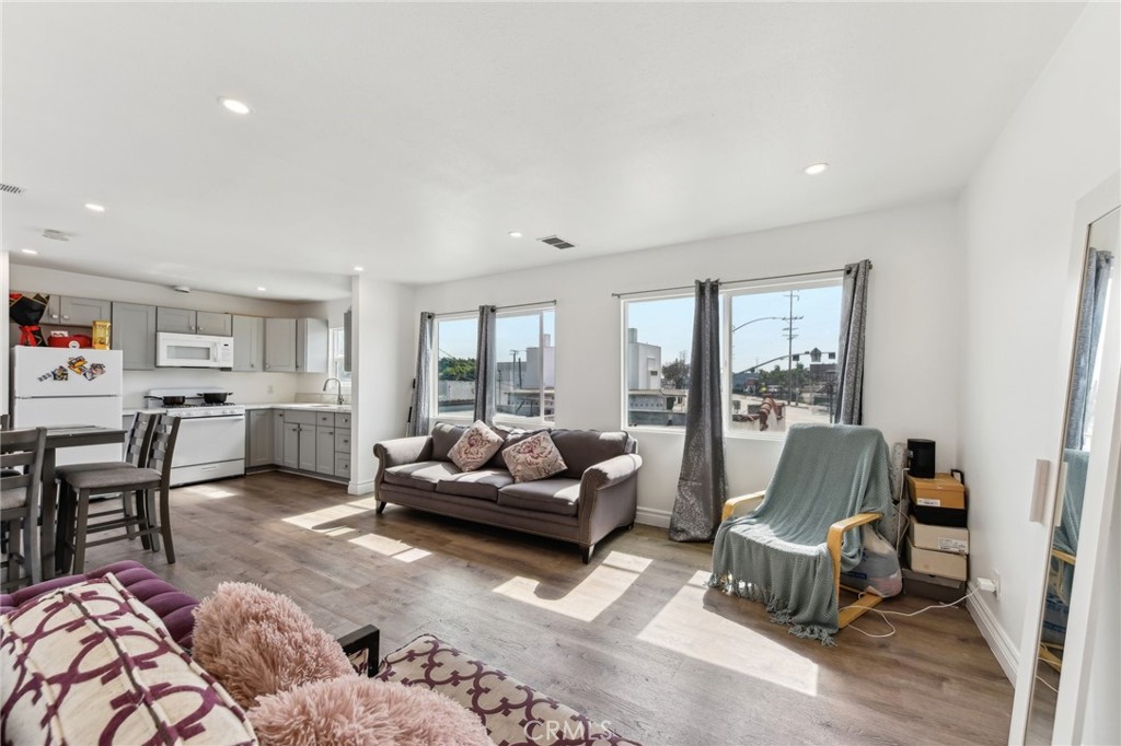 9320 Long Beach Boulevard South Gate, CA 90280 - Photo 7 of 30 a living room with furniture and a large window