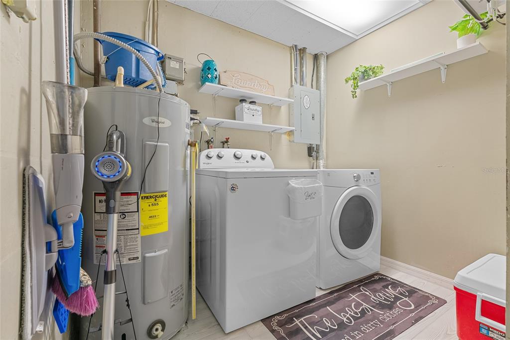 4939 100th Way North St. Petersburg, FL 33708 - Photo 28 of 43 a utility room with dryer and washer