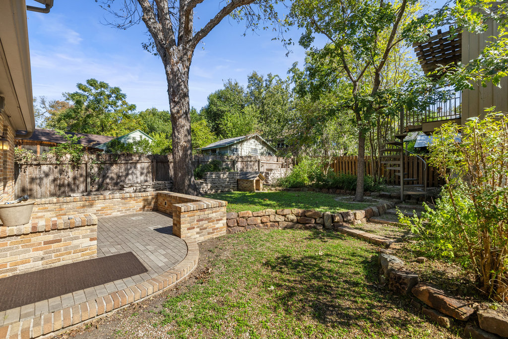 1609 Wethersfield Road Austin, TX 78703 - Photo 31 of 38 Fenced backyard with a patio