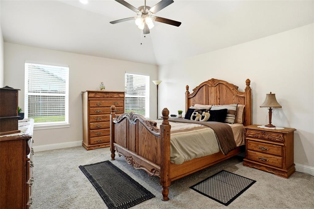 904 Avagail Avenue Springtown, TX 76082 - Photo 17 of 27 a bed room with a bed and a window
