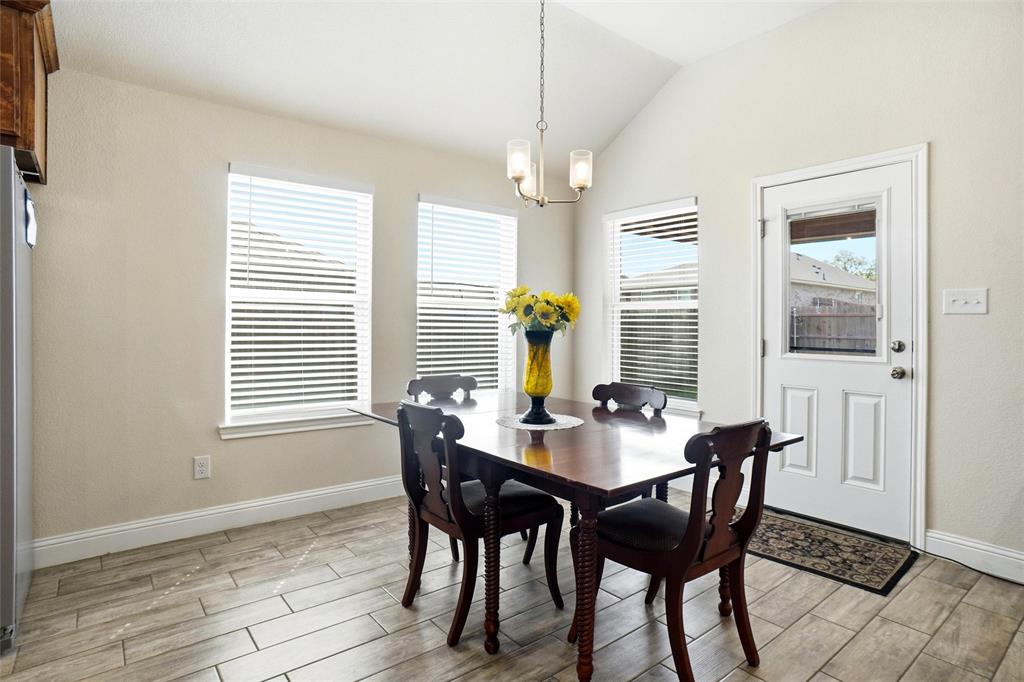 904 Avagail Avenue Springtown, TX 76082 - Photo 10 of 27 a view of a dining room with furniture and window