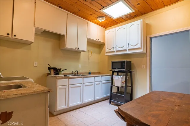 a view of a room with an entryway