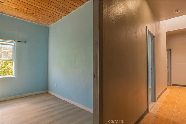 a view of a hallway with closet
