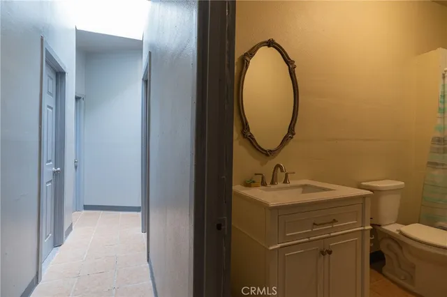 a view of an empty room with a large window