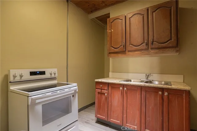 a view of balcony with wooden floor