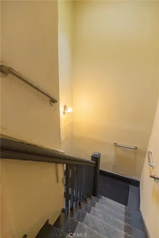 an aerial view of a house with garden space and street view