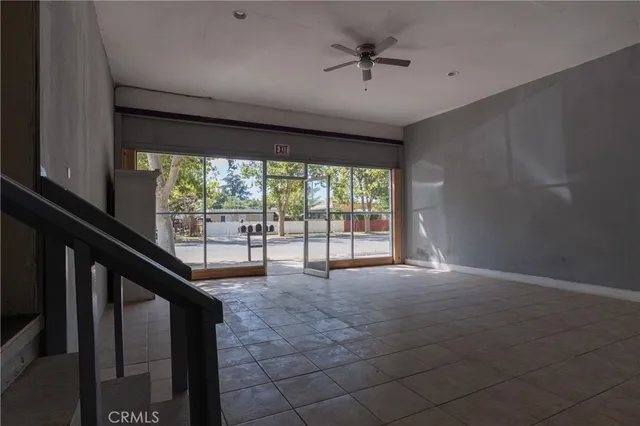 an aerial view of a house with a yard lake view