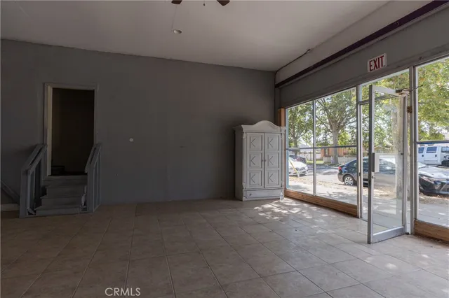 an aerial view of a houses with yard