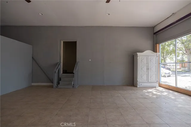 an aerial view of a house with a lake view