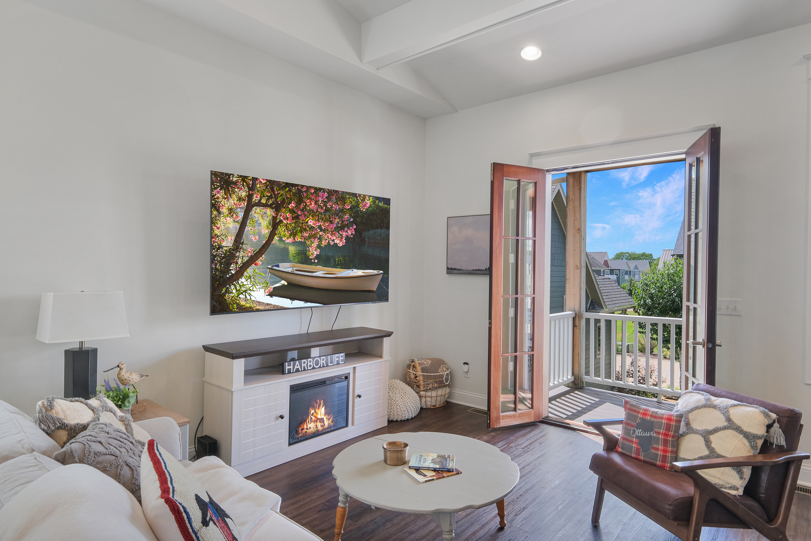 8 Port Place Ottawa, IL 61350 - Photo 7 of 35 a living room with furniture a fireplace and a flat screen tv