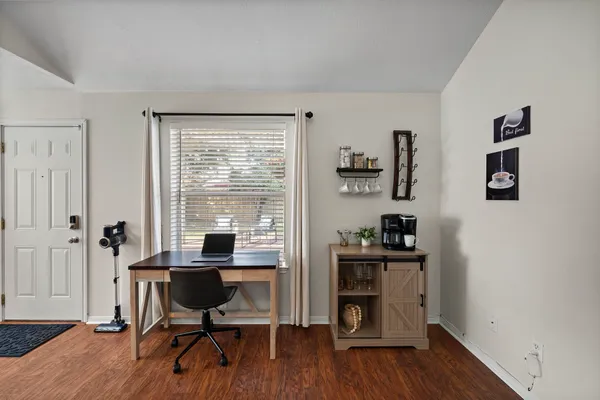 a workspace with wooden floor
