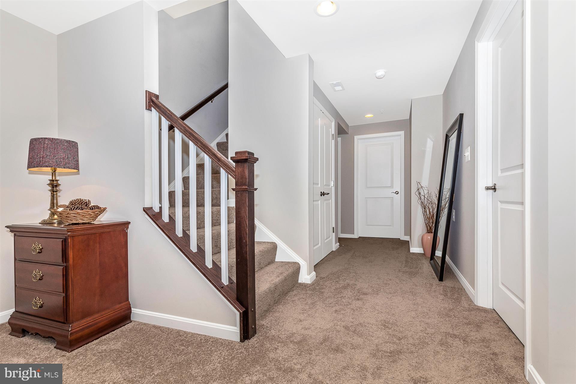 1149 Holden Road Frederick, MD 21701 - Photo 23 of 28 a view of a hallway with staircase and stairs