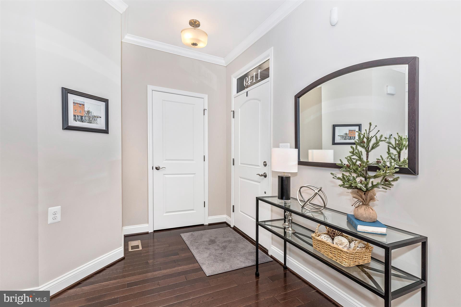 1149 Holden Road Frederick, MD 21701 - Photo 4 of 28 a view of an entryway with wooden floor