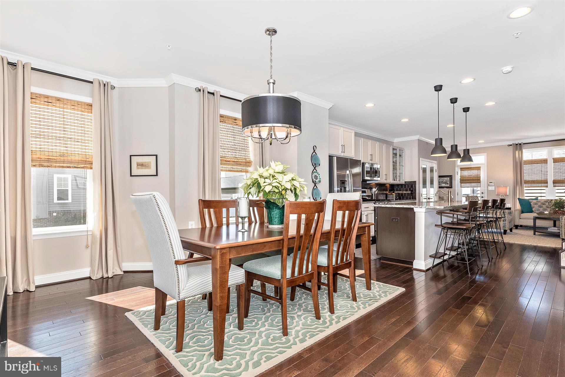 1149 Holden Road Frederick, MD 21701 - Photo 5 of 28 a view of a dining room with furniture window and wooden floor