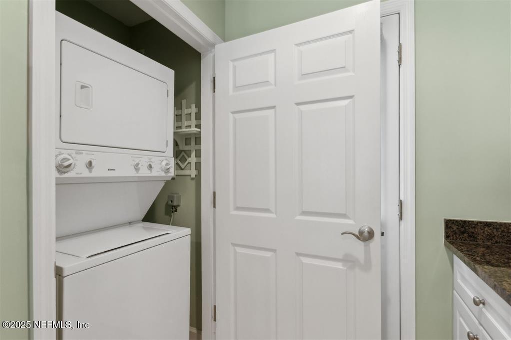 3328 Sea Marsh Road Fernandina Beach, FL 32034 - Photo 19 of 44 a utility room with dryer and washer