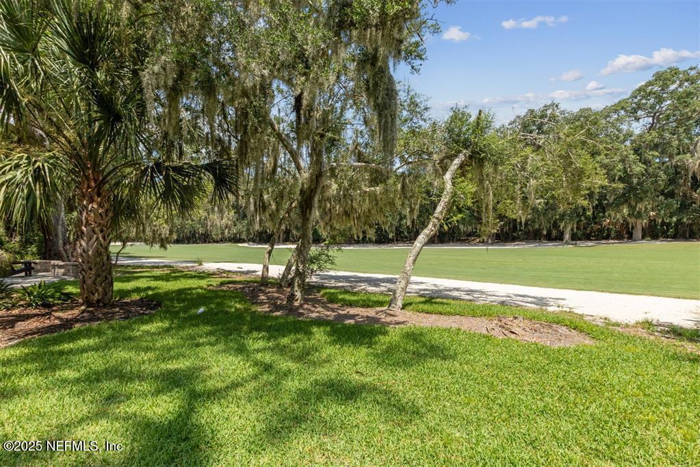 3328 Sea Marsh Road Fernandina Beach, FL 32034 - Photo 33 of 44 a view of a park with large trees
