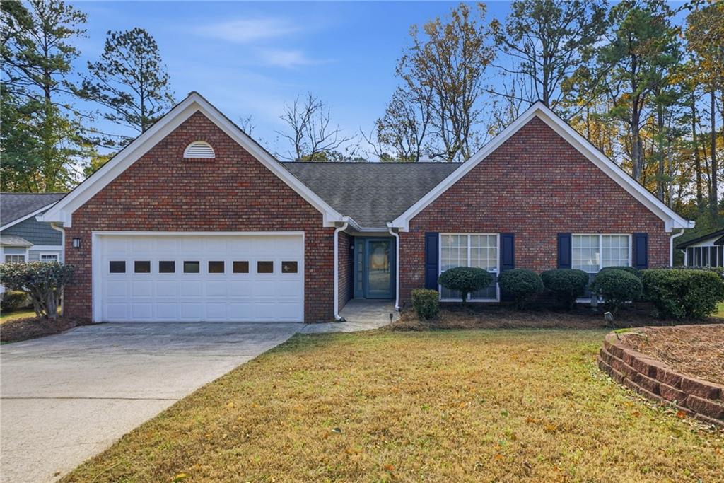 3070 Bugle Drive Duluth, GA 30096 - Photo 1 of 43 a view of a house with a yard plants and large tree