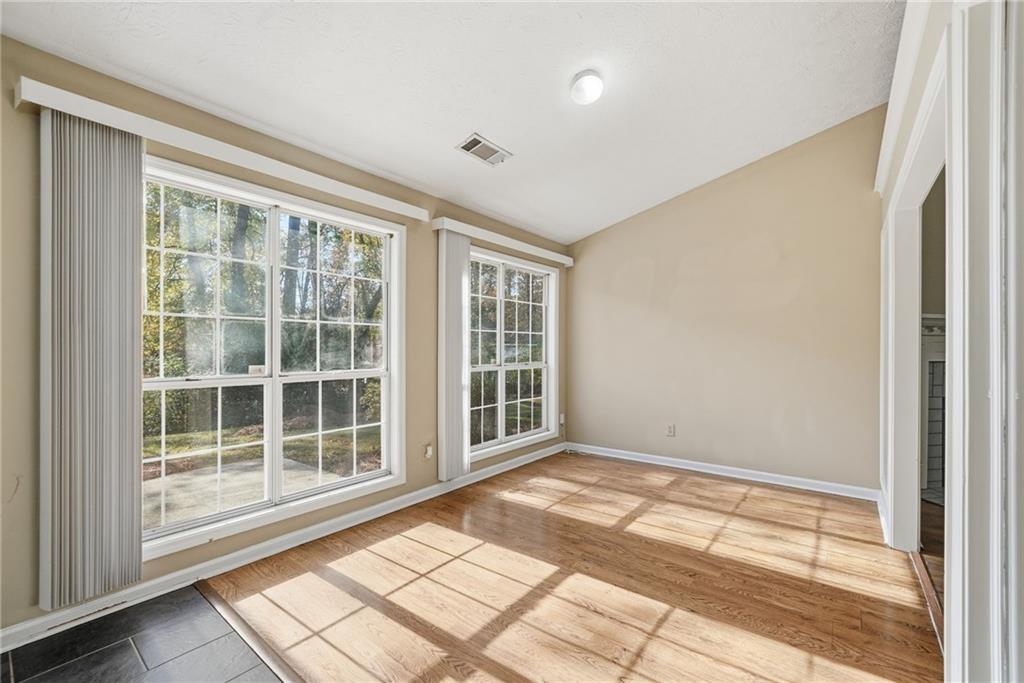 3070 Bugle Drive Duluth, GA 30096 - Photo 8 of 43 a view of empty room with windows