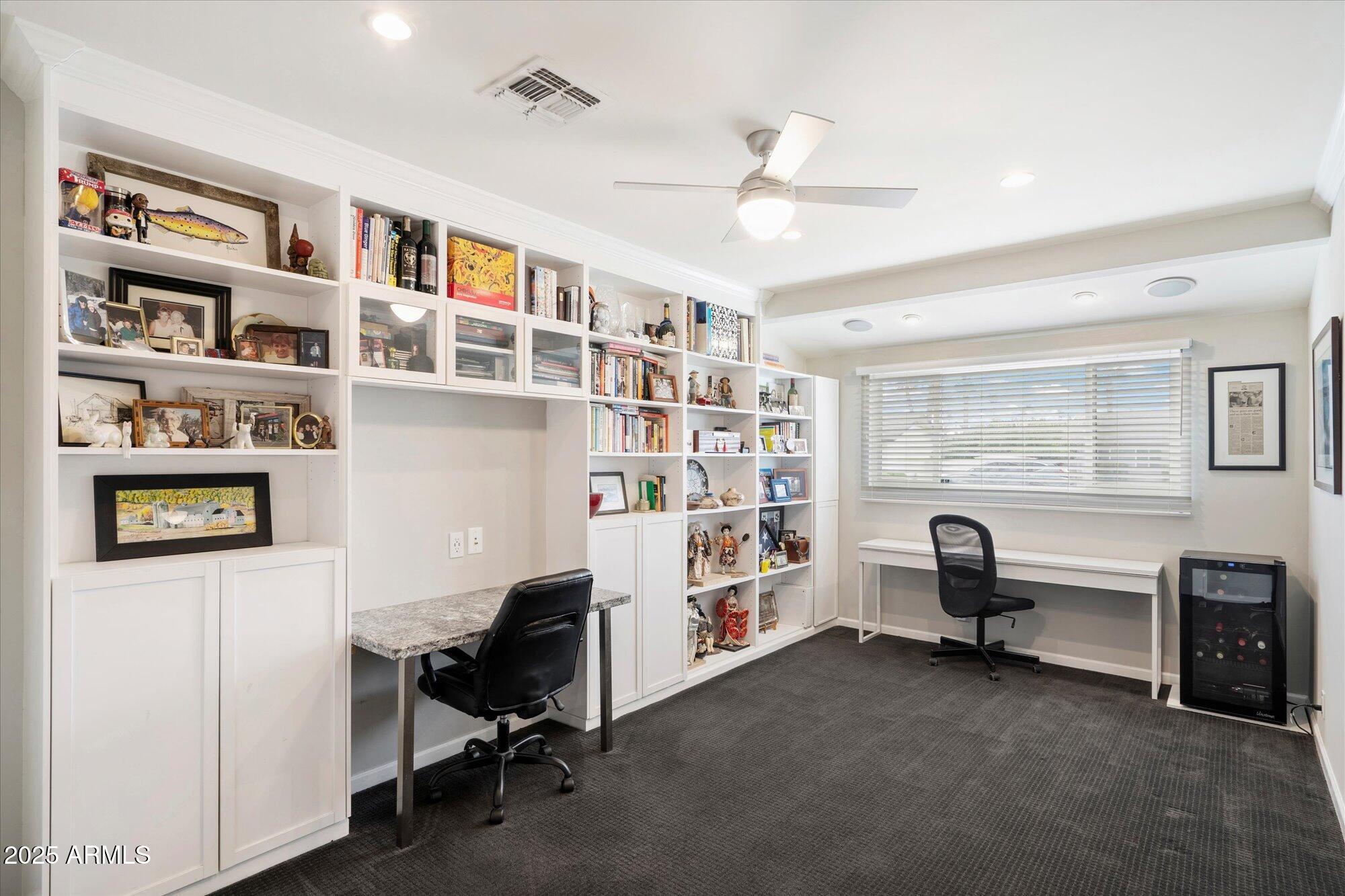 3328 East Turney Avenue Phoenix, AZ 85018 - Photo 12 of 35 a view of a workspace with furniture and cabinet