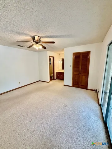 a view of a livingroom with a staircase