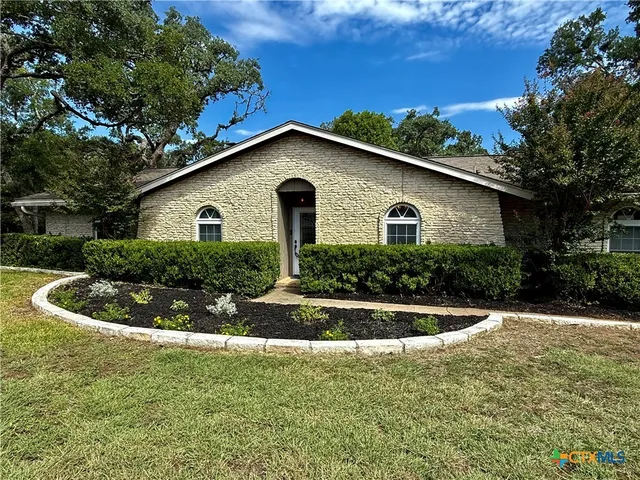 a house view with a outdoor space